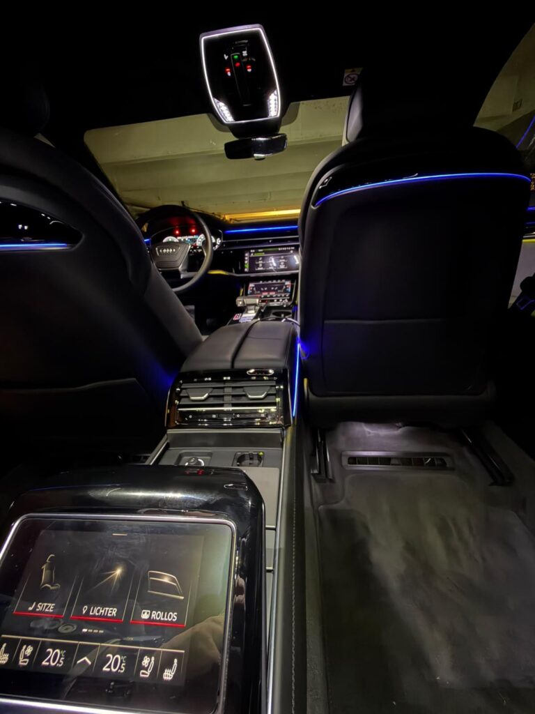 Rear passenger entertainment screen and centre console